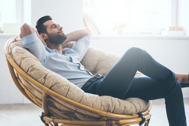 improved-home-comfort-12430 Man relaxing in a chair