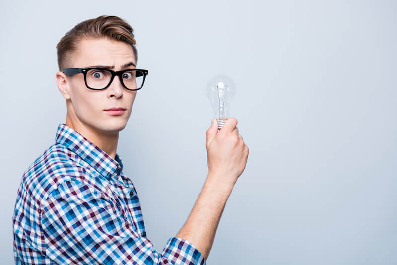 Man holding a lightbulb