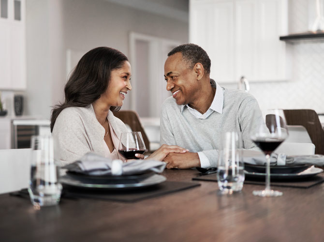 couple sitting at the dining room table