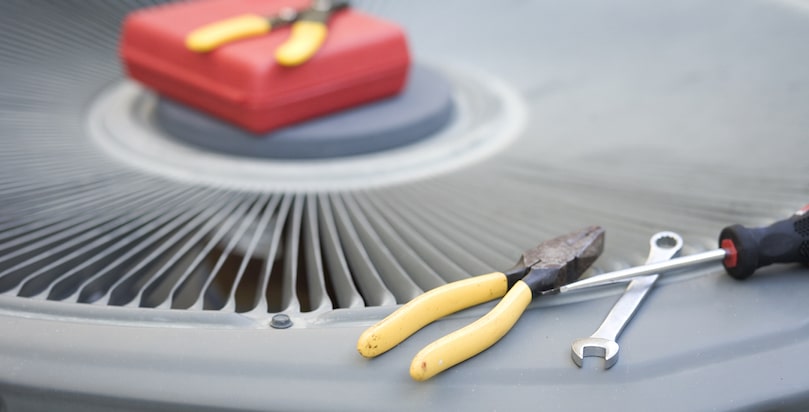 tools on an HVAC unit