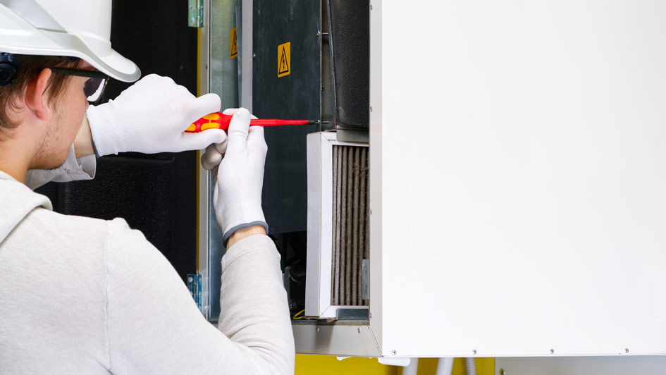 Man fixing furnace