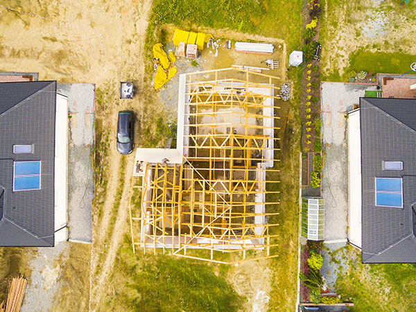 Above view of a new construction build as it gets framed out